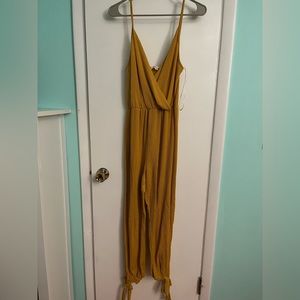 NWT Burnt orange “Rolla Coster” jumpsuit size L! NEW WITH TAGS